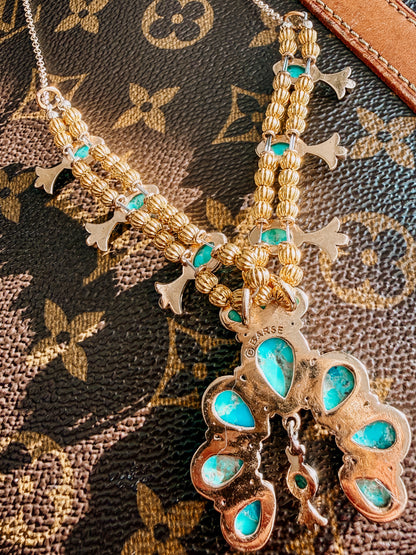 Squash Blossom Statement
Blue Turquoise Golden Necklace