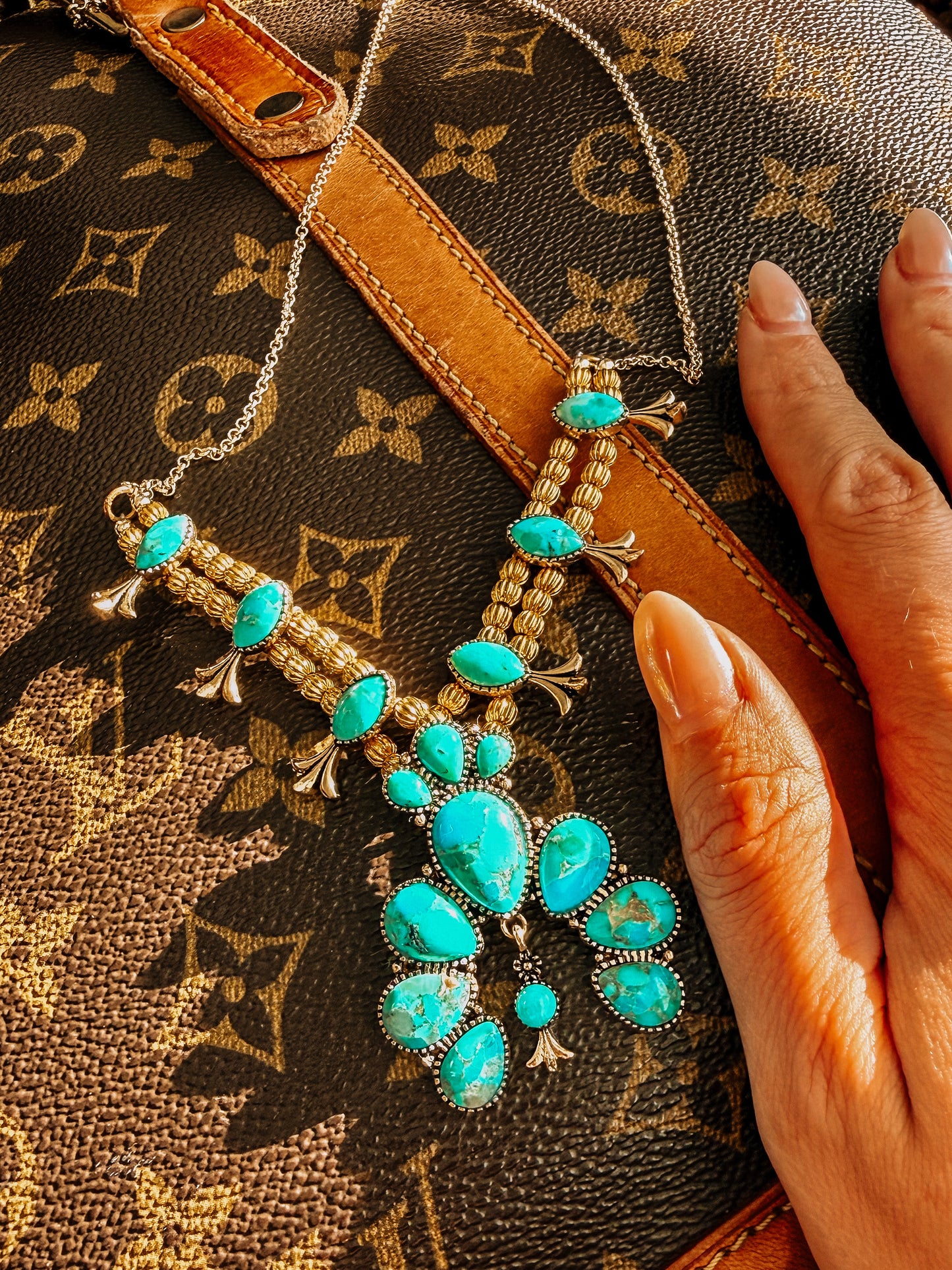 Squash Blossom Statement
Blue Turquoise Golden Necklace
