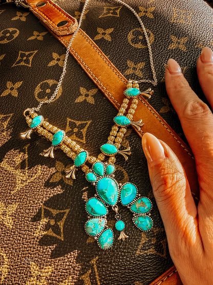 Squash Blossom Statement
Blue Turquoise Golden Necklace